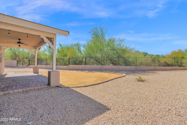 1336 E Belmont Ave, Phoenix, AZ 85020 - fenced backyard featuring ceiling fan and a patio