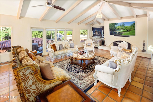 7155 E Oakmont Dr, Paradise Valley, AZ 85253 - living area featuring tile patterned floors, vaulted ceiling with beams, and a ceiling fan