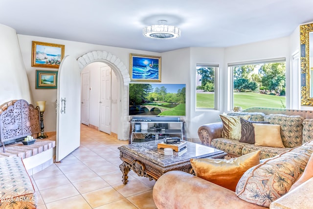 7155 E Oakmont Dr, Paradise Valley, AZ 85253 - tiled living room featuring arched walkways