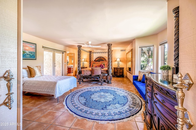 7155 E Oakmont Dr, Paradise Valley, AZ 85253 - bedroom featuring tile patterned floors, access to exterior, french doors, and multiple windows