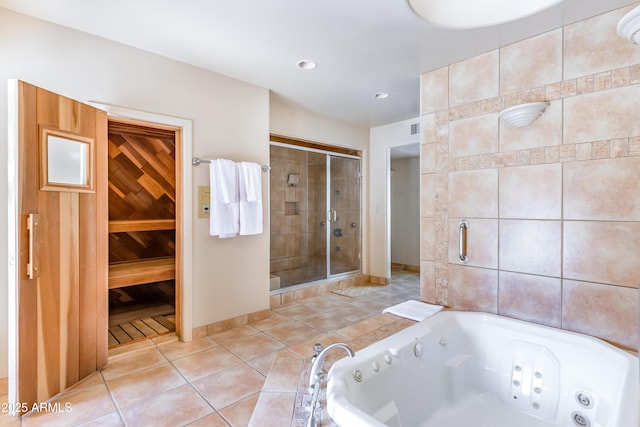 7155 E Oakmont Dr, Paradise Valley, AZ 85253 - full bath with tile patterned flooring, visible vents, recessed lighting, a whirlpool tub, and a stall shower