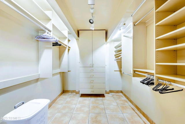 7155 E Oakmont Dr, Paradise Valley, AZ 85253 - walk in closet featuring light tile patterned floors