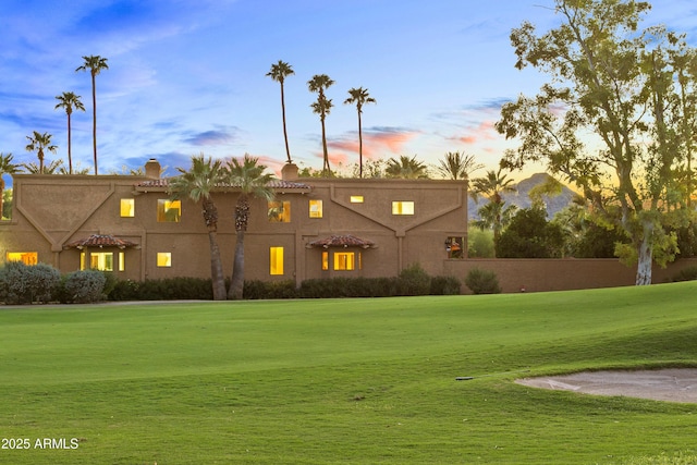 7155 E Oakmont Dr, Paradise Valley, AZ 85253 - exterior space featuring a yard, view of golf course, and a chimney