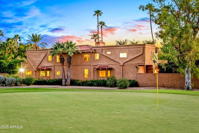 7155 E Oakmont Dr, Paradise Valley, AZ 85253 - view of front of home with stucco siding and a chimney