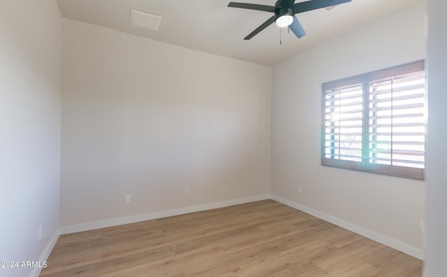 unfurnished room with light hardwood / wood-style flooring and ceiling fan