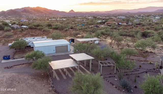 aerial view at dusk with a mountain view