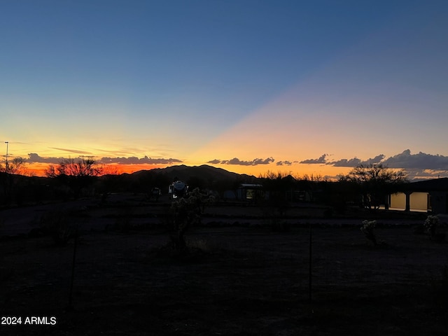 property view of mountains featuring a rural view