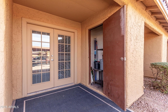 doorway to property with french doors