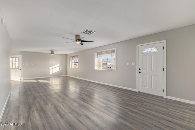 foyer entrance with dark hardwood / wood-style floors, plenty of natural light, and ceiling fan