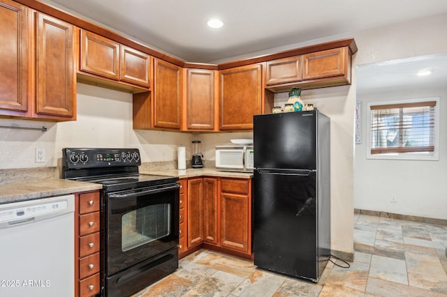 kitchen with black appliances