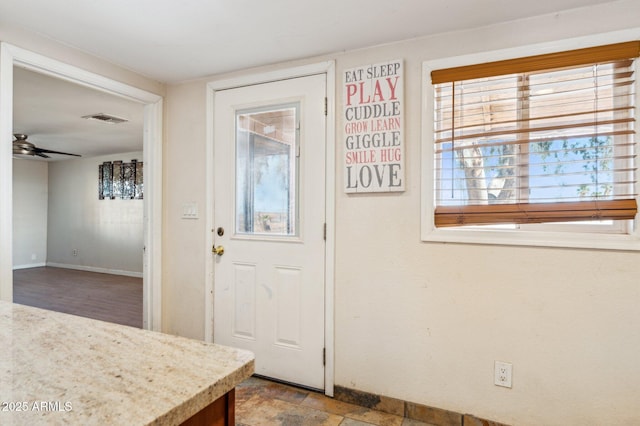 entryway with ceiling fan