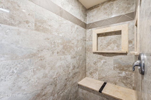 details featuring a tile shower