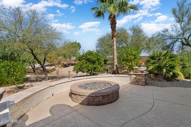 view of patio / terrace with a fire pit