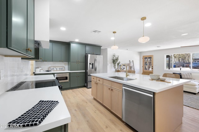 2808 N Steves Blvd, Flagstaff, AZ 86004 - kitchen with visible vents, stainless steel appliances, light countertops, and a sink