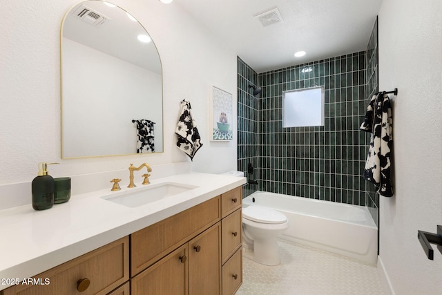 2808 N Steves Blvd, Flagstaff, AZ 86004 - bathroom featuring toilet, visible vents, vanity, and shower / bathing tub combination