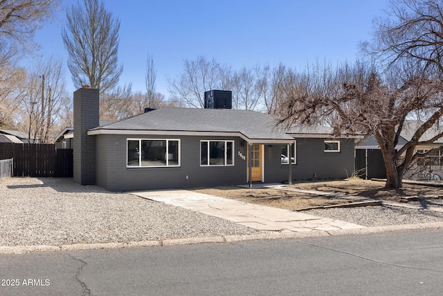 2808 N Steves Blvd, Flagstaff, AZ 86004 - single story home with fence, central AC, and a chimney