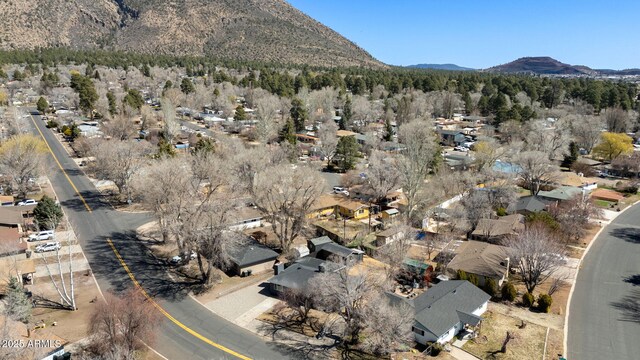 2808 N Steves Blvd, Flagstaff, AZ 86004 - drone / aerial view featuring a mountain view and a residential view