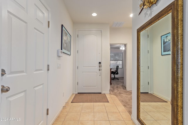 interior space featuring light tile patterned floors