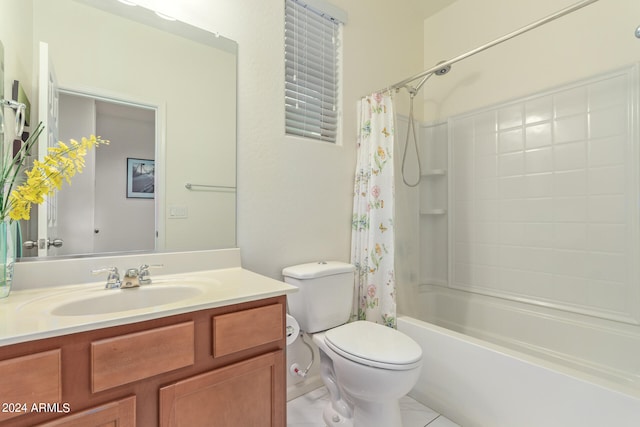 full bathroom featuring tile patterned floors, shower / bath combo, toilet, and vanity