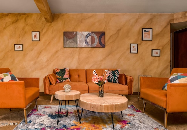 living area featuring beam ceiling