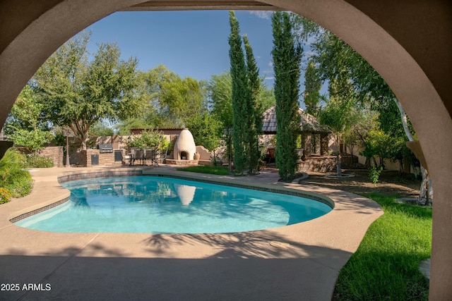 view of pool featuring a gazebo and a patio area