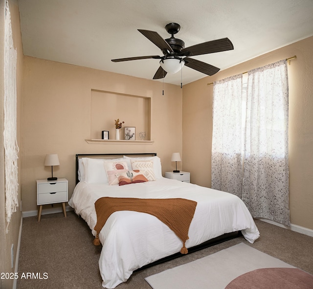 bedroom with carpet flooring and ceiling fan