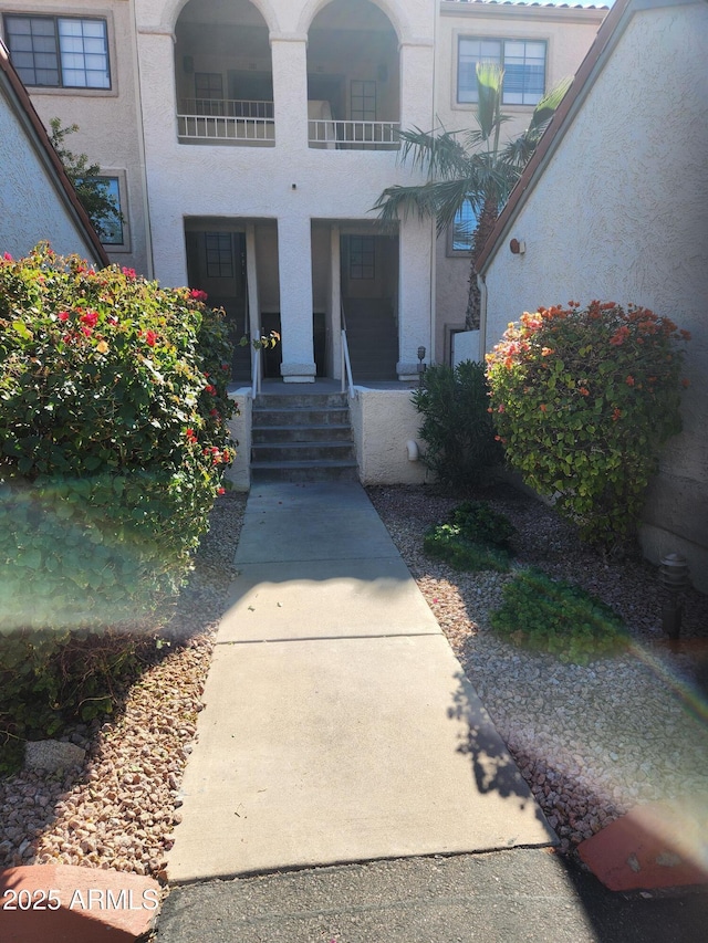 property entrance with a balcony