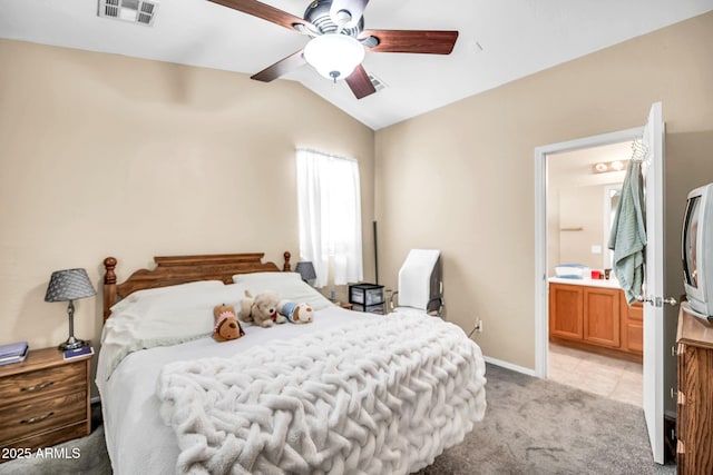 597 S 167th Dr, Goodyear, AZ 85338 - bedroom with light colored carpet, lofted ceiling, ensuite bathroom, and a ceiling fan