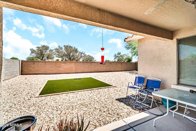597 S 167th Dr, Goodyear, AZ 85338 - fenced backyard with a patio area