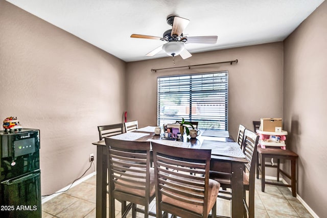 597 S 167th Dr, Goodyear, AZ 85338 - dining area with a ceiling fan and light tile patterned floors