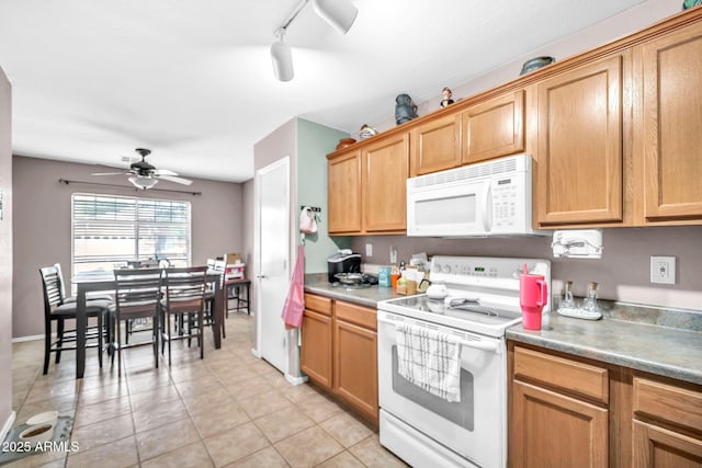 597 S 167th Dr, Goodyear, AZ 85338 - kitchen featuring white appliances, a ceiling fan, light tile patterned floors, and track lighting