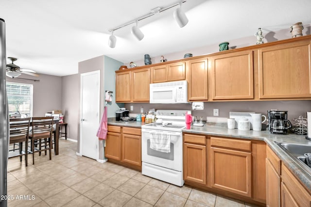 597 S 167th Dr, Goodyear, AZ 85338 - kitchen with white appliances, rail lighting, ceiling fan, and light tile patterned flooring