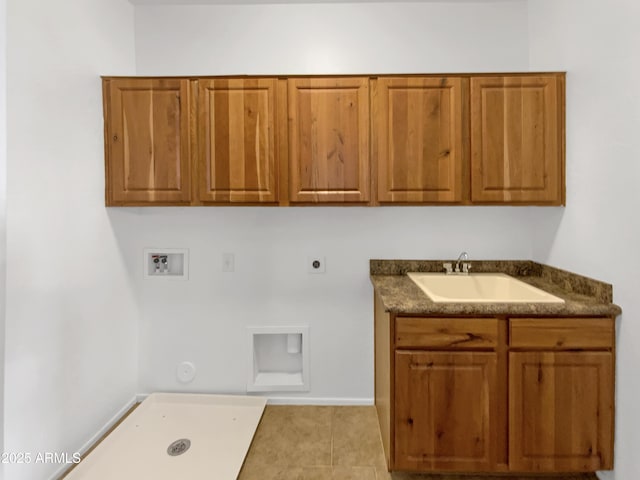 laundry area with sink, cabinets, washer hookup, hookup for an electric dryer, and hookup for a gas dryer