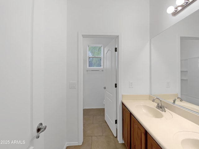 bathroom with vanity and tile patterned floors