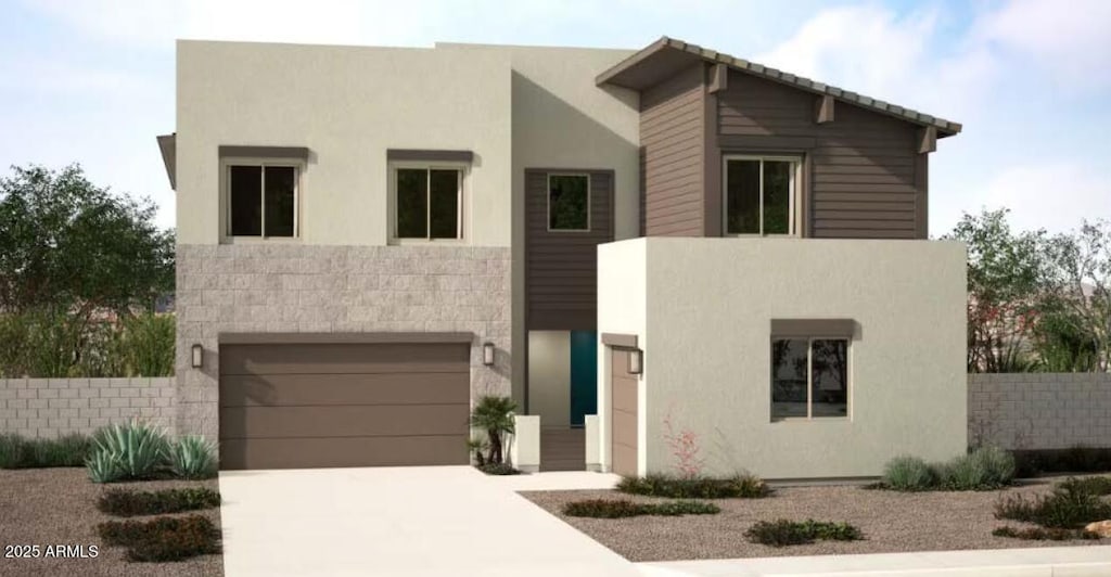 view of front of home featuring fence, a garage, driveway, and stucco siding