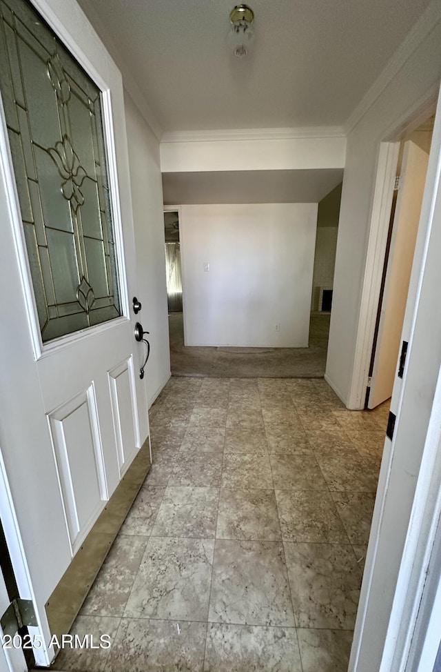 interior space featuring crown molding