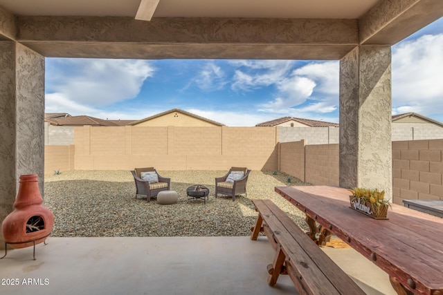 view of patio / terrace with outdoor dining space and a fenced backyard