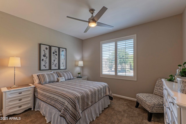 16417 W Piccadilly Rd, Goodyear, AZ 85395 - bedroom with dark colored carpet, baseboards, and a ceiling fan