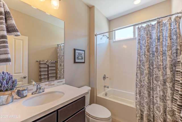 16417 W Piccadilly Rd, Goodyear, AZ 85395 - bathroom featuring shower / bath combo with shower curtain, toilet, and vanity
