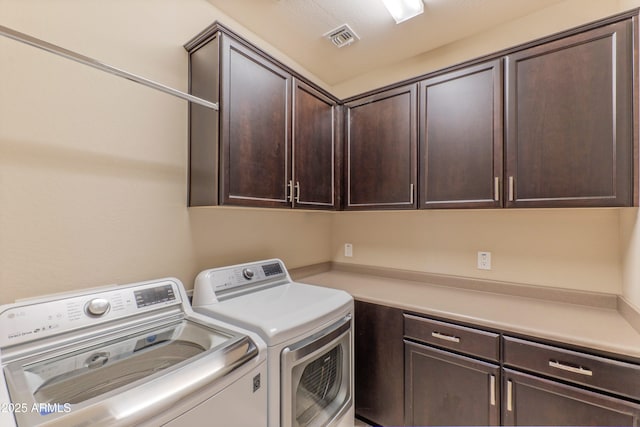 16417 W Piccadilly Rd, Goodyear, AZ 85395 - washroom featuring cabinet space and washer and clothes dryer