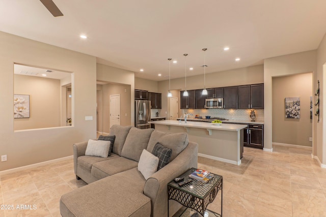 16417 W Piccadilly Rd, Goodyear, AZ 85395 - living area with recessed lighting and baseboards
