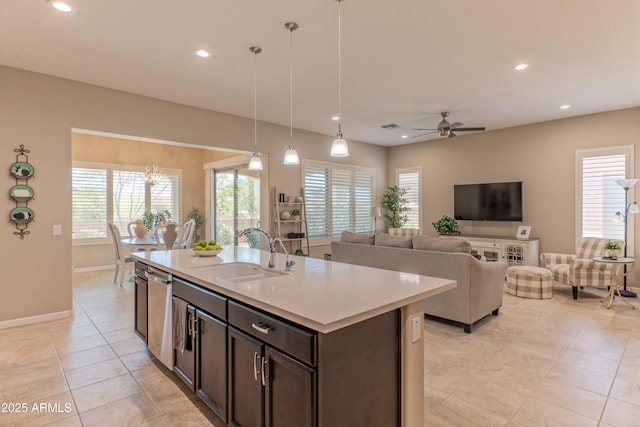16417 W Piccadilly Rd, Goodyear, AZ 85395 - kitchen featuring a sink, stainless steel dishwasher, ceiling fan, recessed lighting, and light countertops