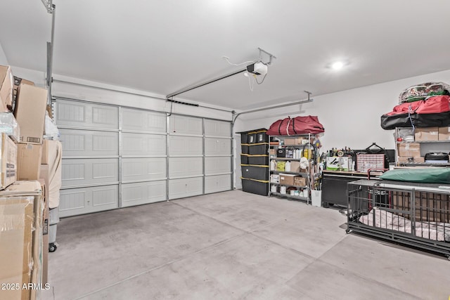 garage featuring a garage door opener