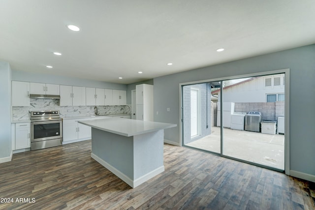 kitchen featuring white cabinets, tasteful backsplash, stainless steel electric range oven, and dark hardwood / wood-style flooring