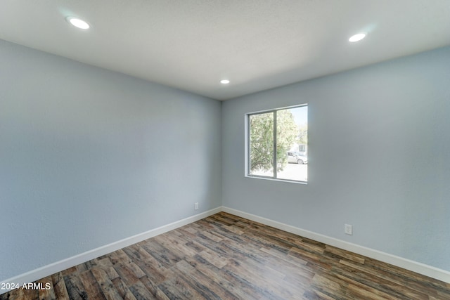 empty room featuring dark hardwood / wood-style floors