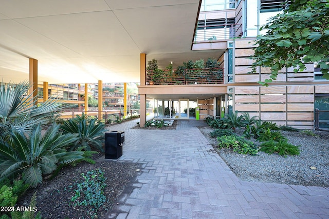 entrance to property featuring a patio