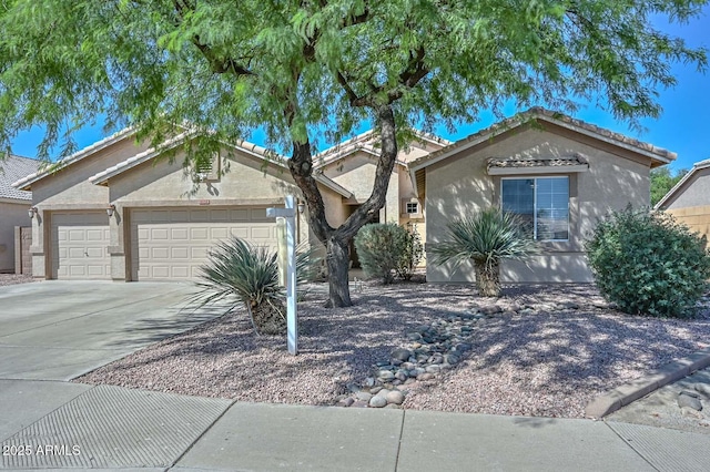 11580 N 86th Ln, Peoria, AZ 85345 - ranch-style house featuring an attached garage, stucco siding, driveway, and a tiled roof