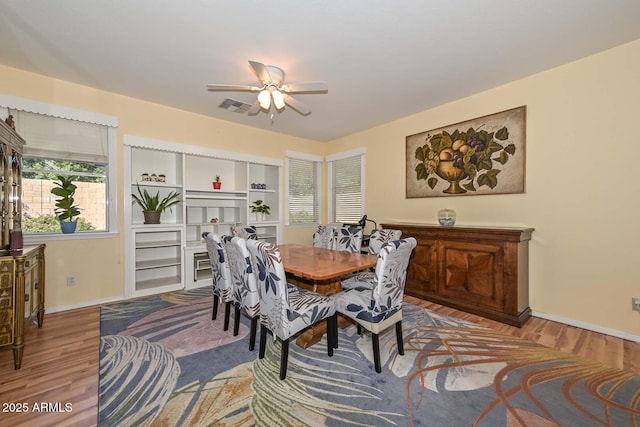 11580 N 86th Ln, Peoria, AZ 85345 - dining space with wood finished floors and ceiling fan