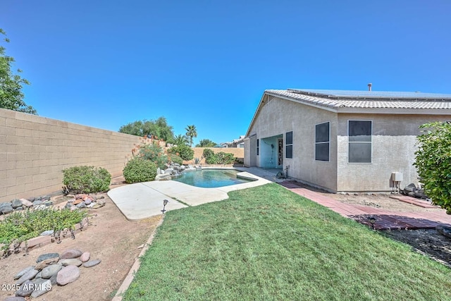 11580 N 86th Ln, Peoria, AZ 85345 - fenced backyard with a patio area