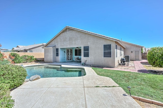 11580 N 86th Ln, Peoria, AZ 85345 - rear view of property with a patio, stucco siding, a fenced backyard, and french doors